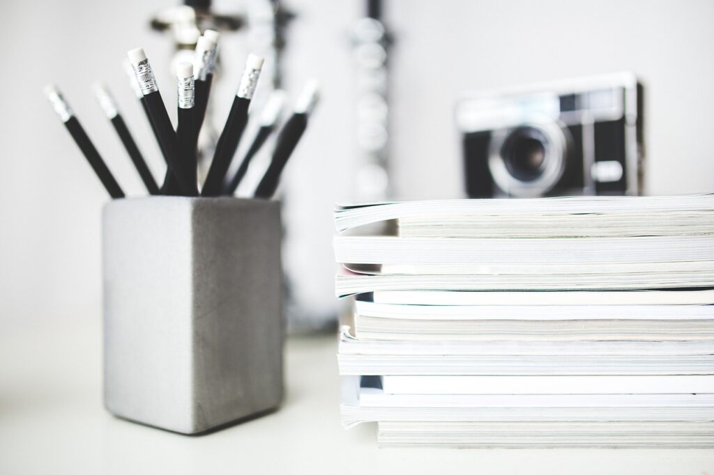 There are multiple pencils in a pencil stand